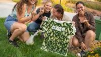 Students laughing, making tie-dye